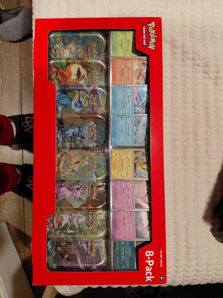 Prismatic Evolutions Costco Tin Collection