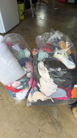 Three bags of clothes new and in used great condition