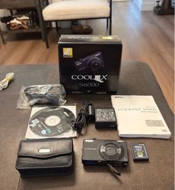 Nikon Coolpix S6000 Digital Camera with Accessories