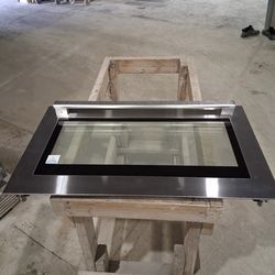 Stainless steel oven door