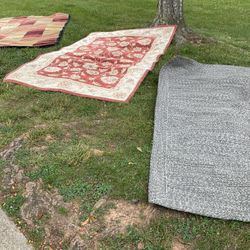 Three Different Sizes Comforters The Biggest One With Squares (128” Long X 92” Wide ) $75, The Red One (85” Long X 60” Wide) $60, The Gray One $25
