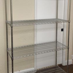 Shelf Rack Metal 4 levels like new. H73”, W48”, Deep18”,Very strong. 1000lbs per level=4000lbs. Boca
