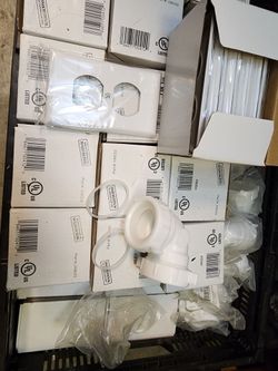 40 boxs of 10 outlet covers and 40 bent pipe joints
