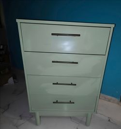 Modern 4-Drawer Chest of Drawers – Pastel Mint Green Dresser with Slim Dark Handles & Tapered Legs