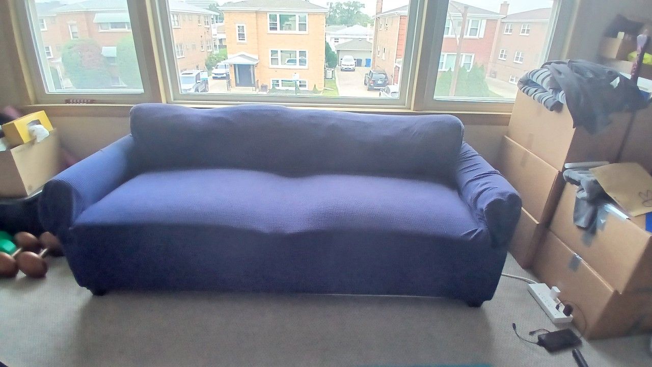 Small Couch with Navy Blue Slipcover 