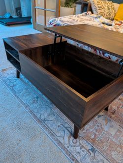 Coffee table lift top