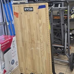 RYOBI TABLE DOLLEY 100$