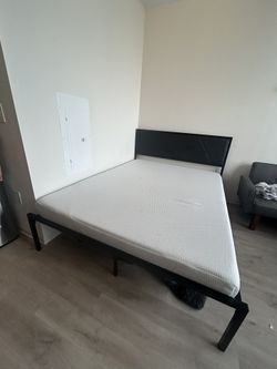 Queen-Size Memory Foam Mattress with Modern Black Bed Frame