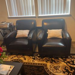 Two Dark Brown Sofas