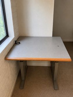 Height adjustable work table