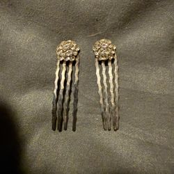 pair of vintage-style metal hair combs