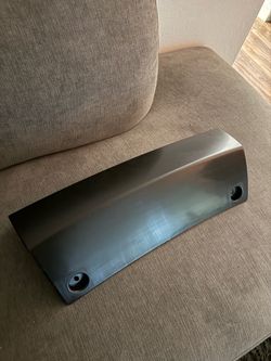 Rear bumper hitch cover
