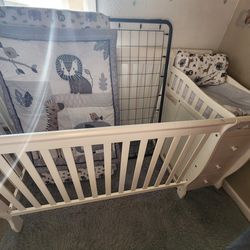 Crib with changing table