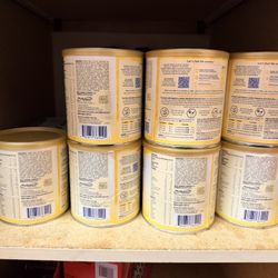 Yellow Enfamil Cans 