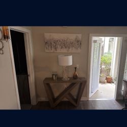 Table With Lamp And Wall Art 