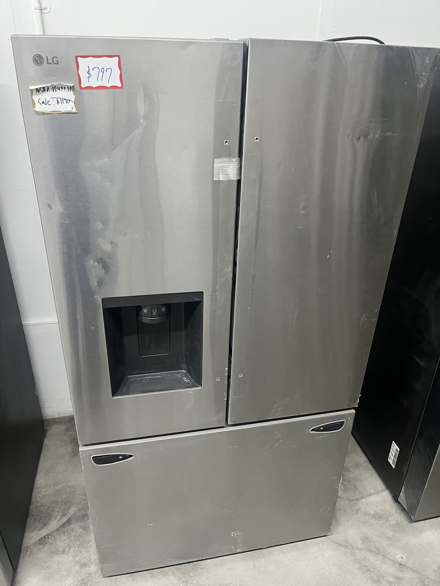 Major scratch/dent BUT WORKS PERFECT! Brand new LG Refrigerator