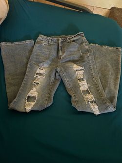 size 28 ripped jeans