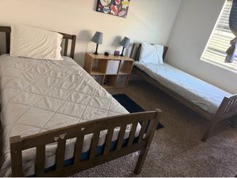 2 twin beds with dresser