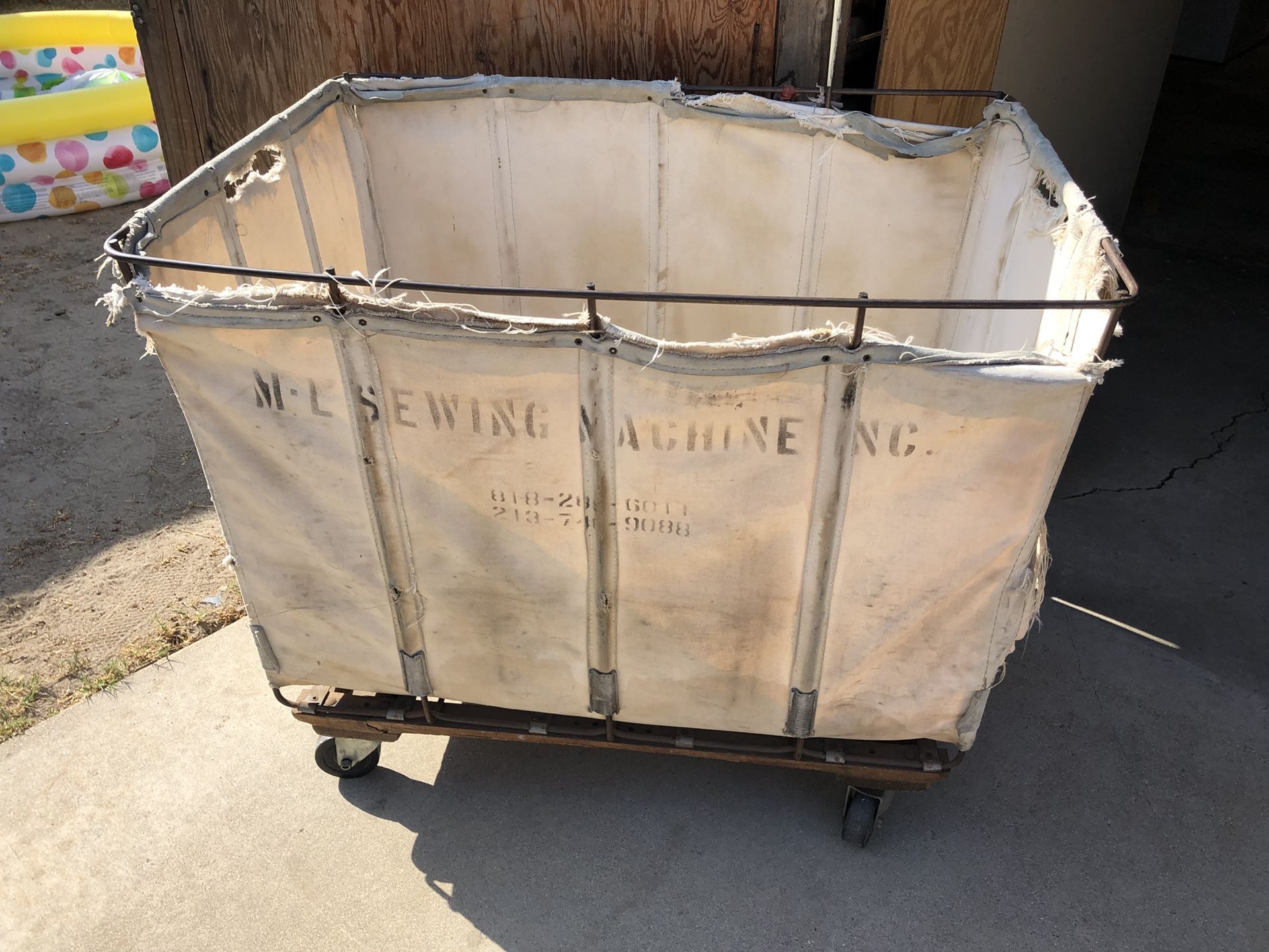 Vintage industrial laundry cart free!! Need it gone.
