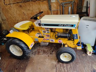 1969 cub cadet 73 pulling tractor