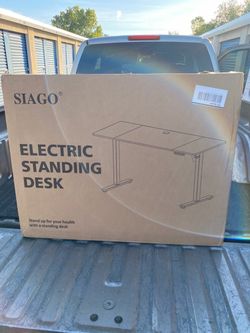 Brand new in box electric table &150