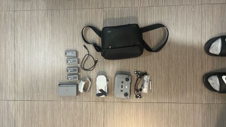 DJI mini 4K barely used 4 batteries and accessories