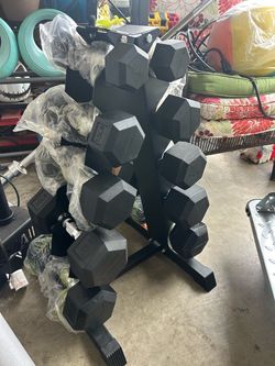 New dumbbell tree with dumbbells with 150 pounds dumbbells