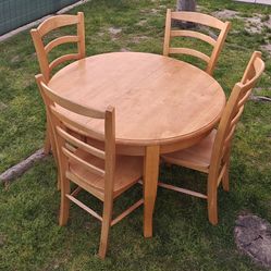 Solid wood round dining table with 4 chairs