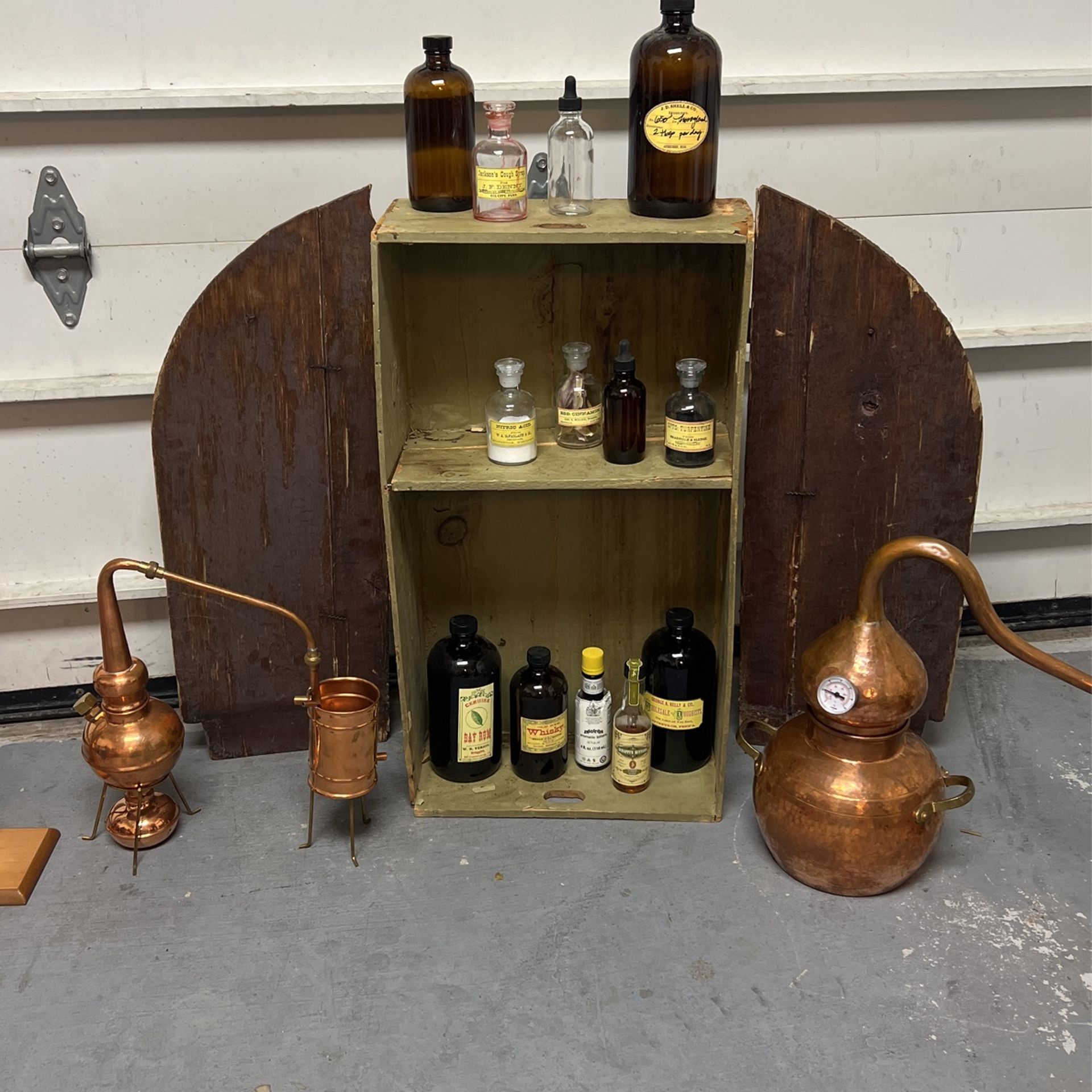 Copper Stills and Antique Druggist Bottles