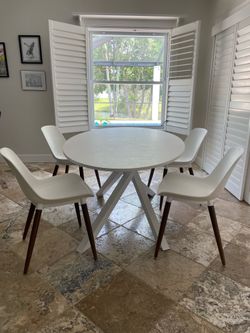 Oval table with 4 chairs