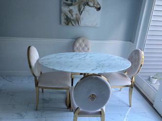 Oval marble gold table with chairs