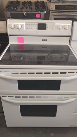 Maytag glass top electric stove/ double oven