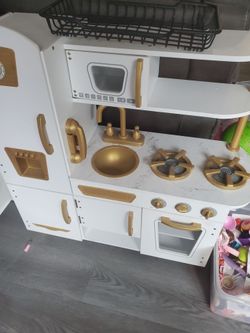Kitchen with toy accessories and cart
