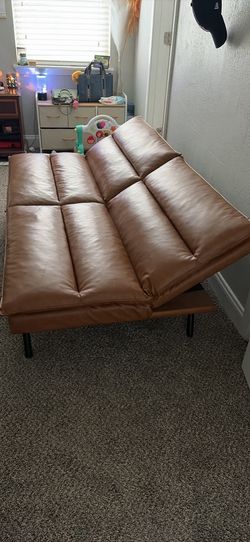 Brown faux leather futon