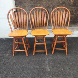 Three (3) Arched Wooden Stools 