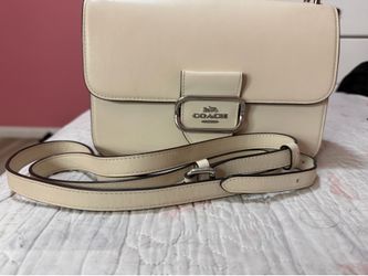white Coach bag