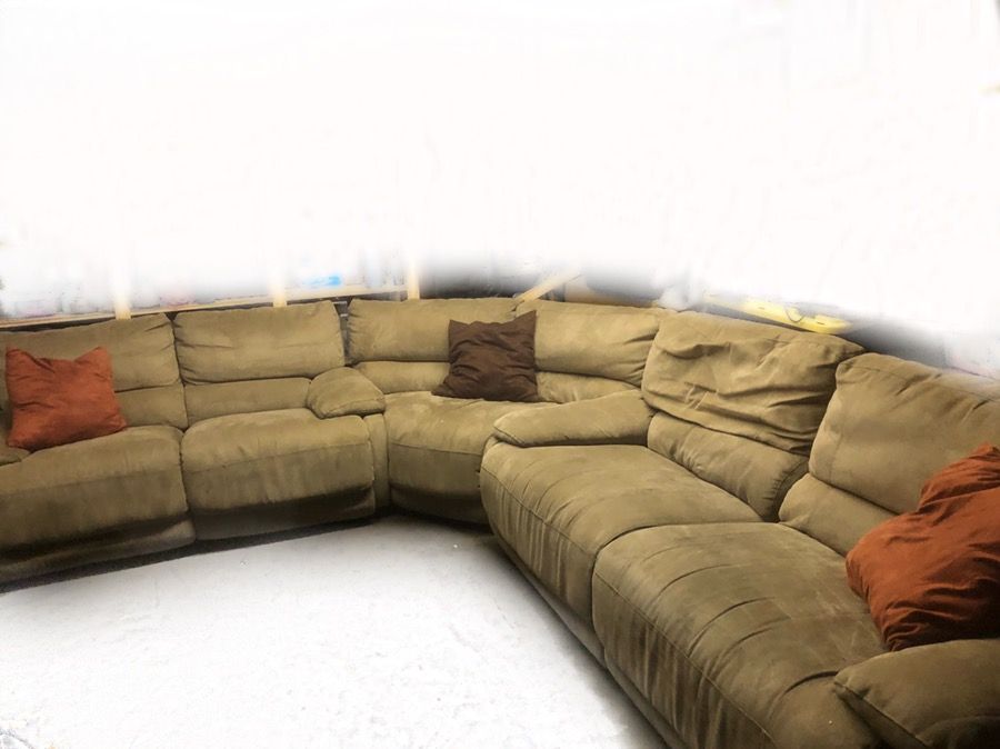 Tan reclinable couches