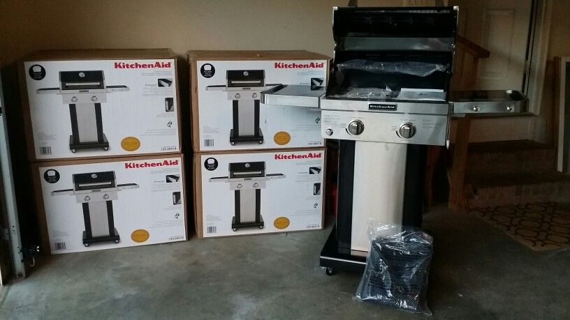 2 burner propane/gas. NEW IN BOX W/GRILL COVER