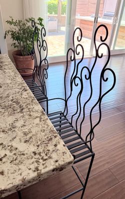Custom wrought iron counter height chairs and bistro table