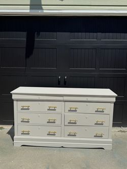 Elegant White Wood Dresser with Gold Hardware