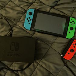 Nintendo Switch With Base And Extra Remote