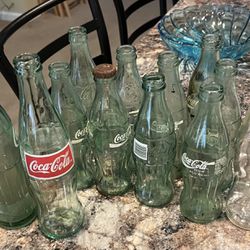 Vintage Coke And Pepsi Bottles