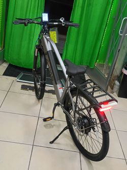 AiPas C2 Express ELECTRIC BIKE MOTOR 750W-28MPH-RANGE 68MILES
Aipas C2 Xpress Electric Bike, featuring a sleek silver frame, front suspension, and a r