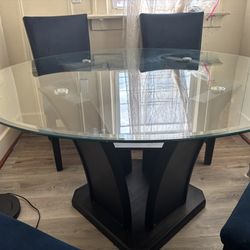 Dinner table with chairs