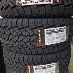 (4) 285/55r20 ROADTRACK A/T 10-ply LT E Rated 285 55 20 Inch