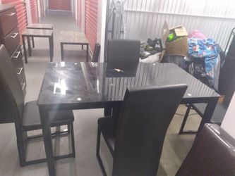 Table And Four Chairs