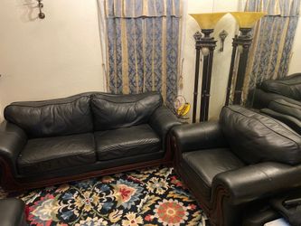 Black Italian leather sofa’s