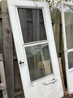 Screen Door with retractable screen built into door