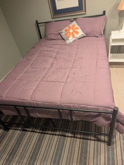 Two New Black Metal Bed Frames and Full size mattresses 100 each