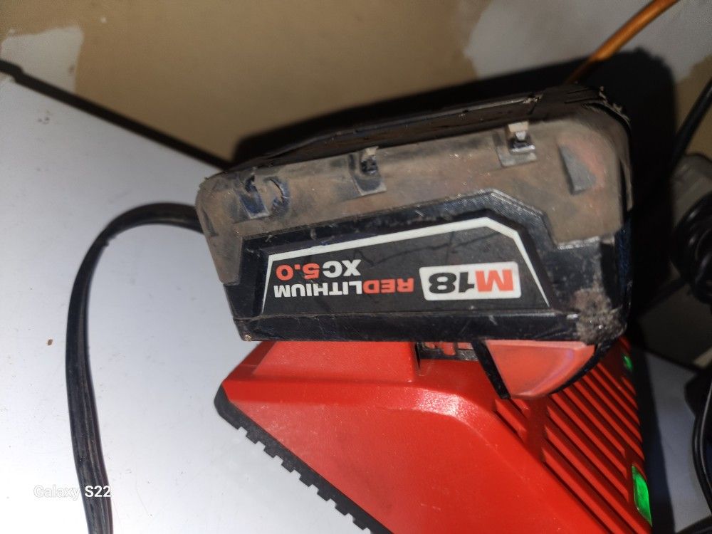 Milwaukee Charger And 3 Batteries